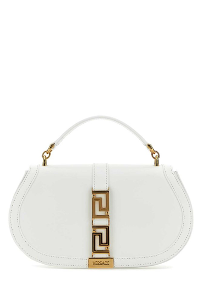 Shop Versace Greca Goddess Foldover Top Shoulder Bag In White