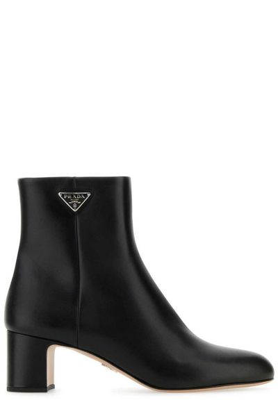 Shop Prada Logo Plaque Rounded Toe Boots In Black