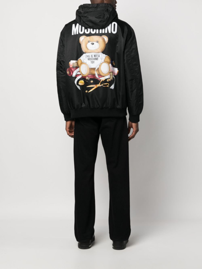 Shop Moschino Teddy Bear Padded Hooded Jacket In Black