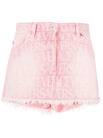 Shop Versace Monogram-jacquard Denim Miniskirt In Pink