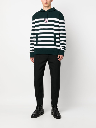 Shop Balmain Striped Wool-blend Knitted Hoodie In 绿色