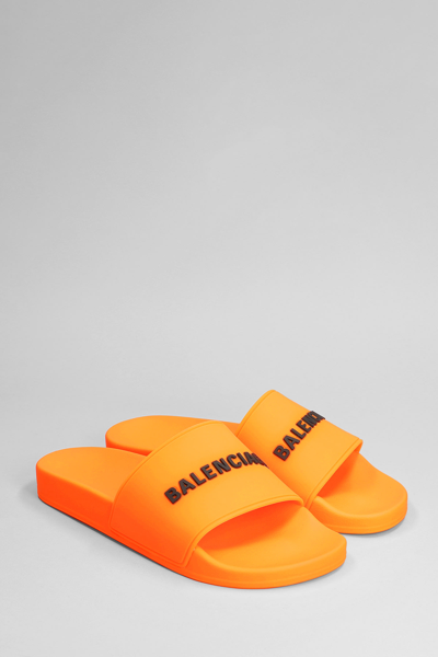 Shop Balenciaga Flats In Orange Rubber/plasic