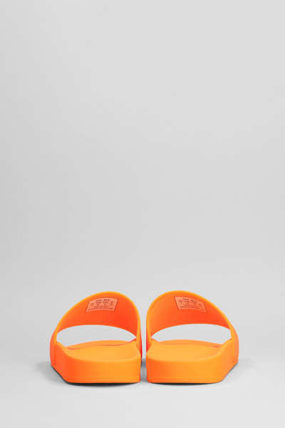 Shop Balenciaga Flats In Orange Rubber/plasic