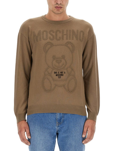 Shop Moschino Teddy Bear In Brown