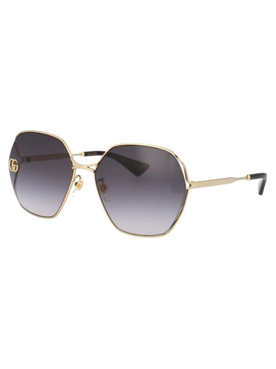 Shop Gucci Sunglasses In 005 Gold Gold Grey