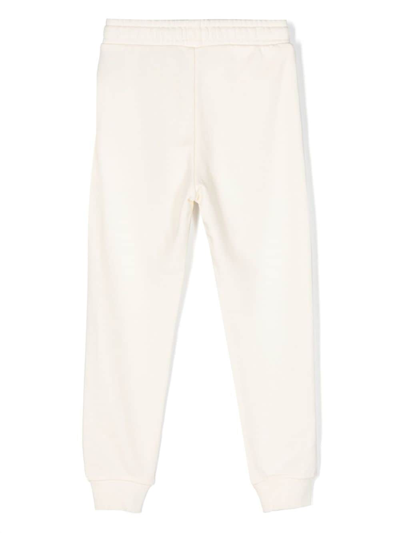 Shop Moschino Logo-print Cotton Track Pants In White
