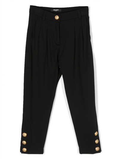 Shop Balmain Buttoned-cuff High-waisted Trousers In Black