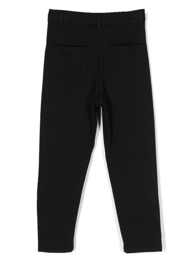 Shop Balmain Buttoned-cuff High-waisted Trousers In Black