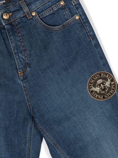 Shop Balmain Logo-embroidered Slim-cut Jeans In Blue