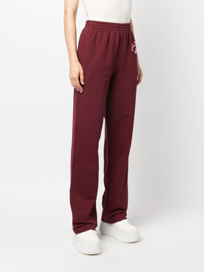 Shop Patou Appliqué-logo Organic Cotton Track Pants In Red