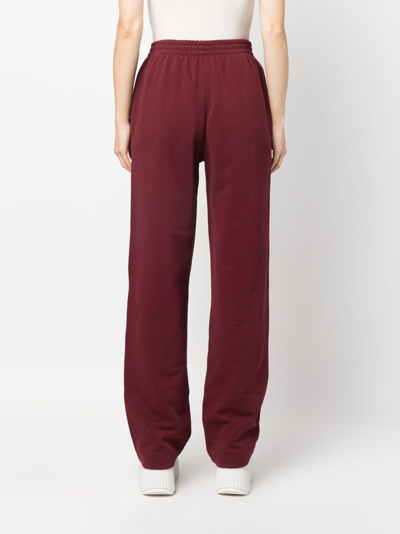 Shop Patou Appliqué-logo Organic Cotton Track Pants In Red