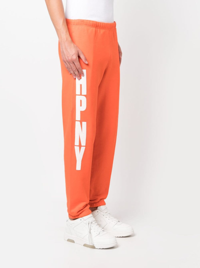 Heron Preston Hpny-print Tapered Track Pants In Orange