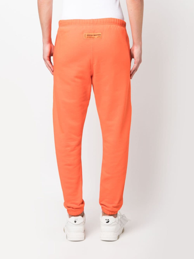 Heron Preston Hpny-print Tapered Track Pants In Orange