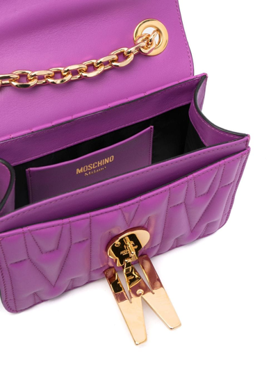 Shop Moschino Logo-quilted Leather Shoulder Bag In Purple