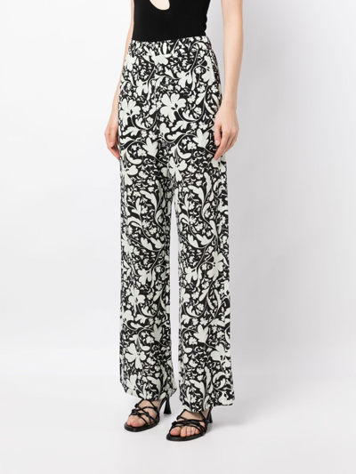 Shop Stella Mccartney Lower Floral-printe Wide-leg Trousers In White