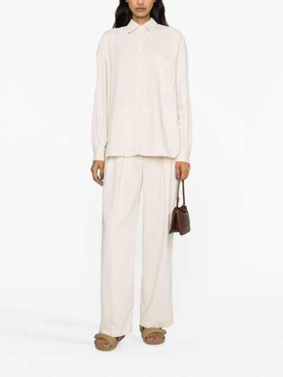 Shop The Frankie Shop Tansy Double-pleated Pinstripe Trousers In Nude