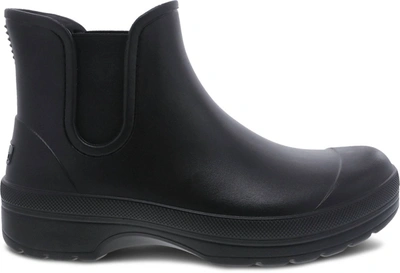 Shop Dansko Karmel Rain Boot In Black