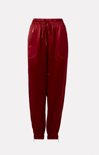 Shop Milly Rylan Hammered Satin Joggers In Wine In Pink