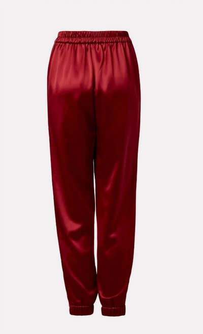 Shop Milly Rylan Hammered Satin Joggers In Wine In Pink