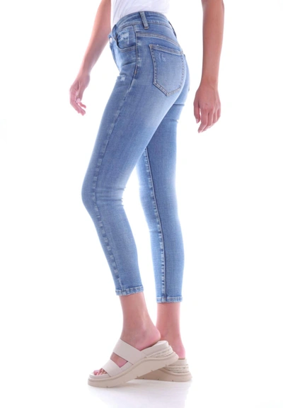 Shop Bianco Ariella Mid Rise Distressed Skinny Jean In Light Wash In Blue