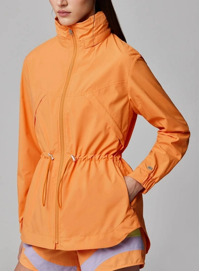 Shop Soia & Kyo Raven Hooded Rainwear Coat In Melon In Orange