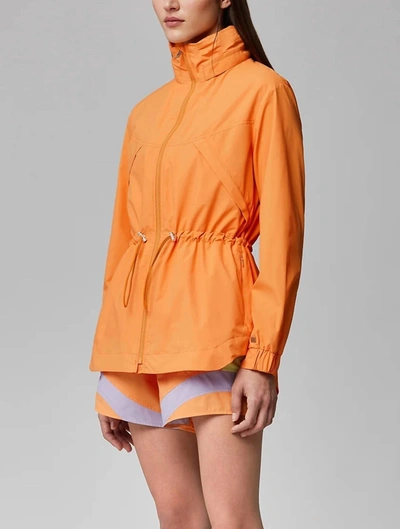 Shop Soia & Kyo Raven Hooded Rainwear Coat In Melon In Orange