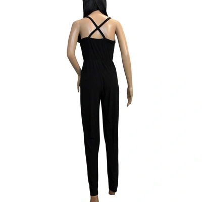 Shop Bebe Ruffle Jumpsuit In Black