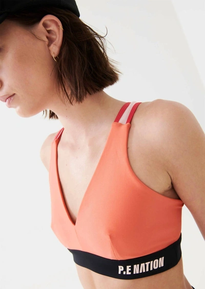 Shop P.e Nation High Press Sports Bra In Persimmon In Gold