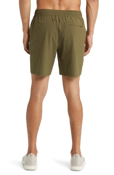 Shop Beyond Yoga Pivotal Performance Shorts In Beyond Olive