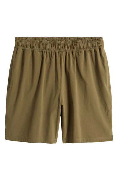 Shop Beyond Yoga Pivotal Performance Shorts In Beyond Olive