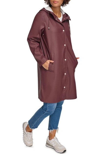Shop Levi's Water Resistant Hooded Long Rain Jacket In Decadent Chocolate