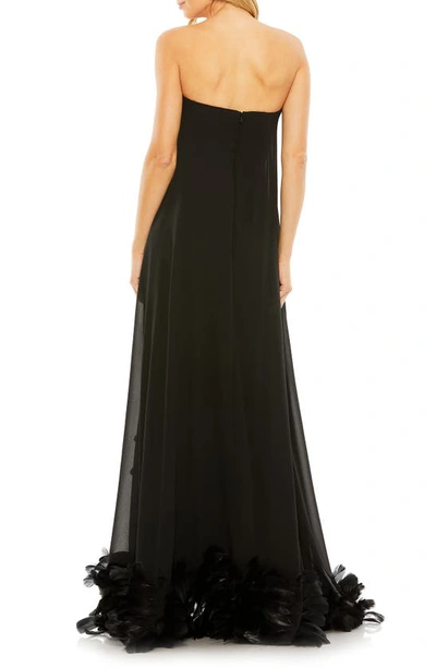Shop Mac Duggal Strapless Feather Hem High Low Gown In Black