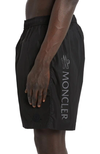 Shop Moncler Reflective Logo Nylon Swim Trunks In Black