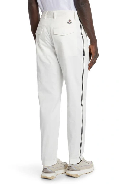 Shop Moncler Side Stripe Cotton Stretch Gabardine Trousers In White