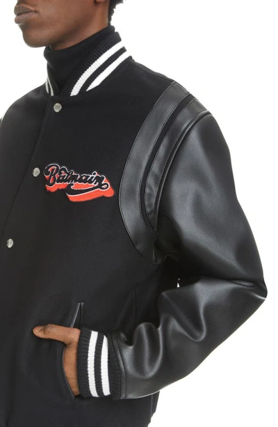 Shop Balmain Mixed Media Logo Patch Leather & Virgin Wool Varsity Jacket In 0pa - Black