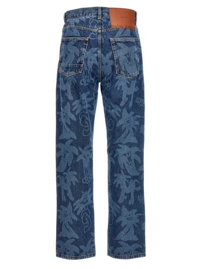 Shop Palm Angels Palmity Allover Laser Jeans Blue