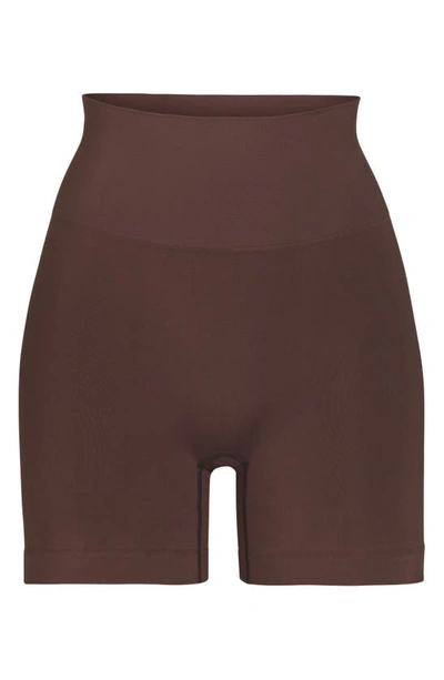 Shop Skims Soft Smoothing Seamless Shorts In Cocoa