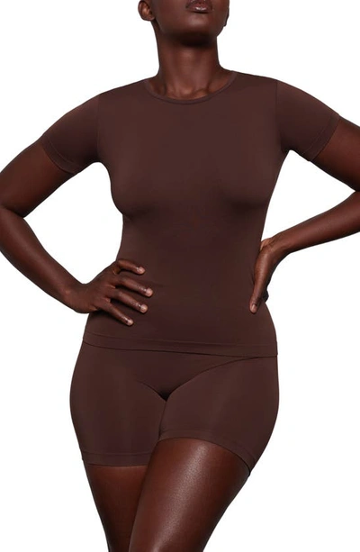Shop Skims Soft Smoothing Seamless T-shirt In Cocoa