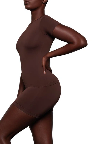 Shop Skims Soft Smoothing Seamless T-shirt In Cocoa