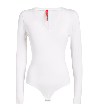 Shop Spanx Long-sleeved Bodysuit In White