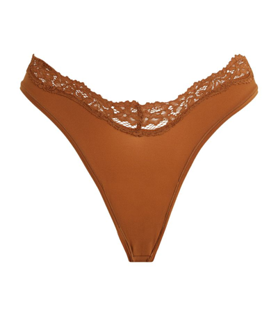 Shop Skims Fits Everybody Lace-trim Dipped Thong In Brown
