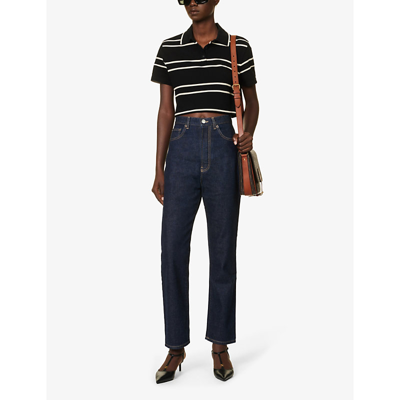 Shop Saint Laurent Women's Noir Naturel Cropped Striped Cotton-piqué Polo Shirt