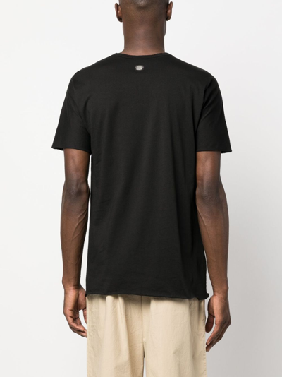 Shop Isaac Sellam Experience Logo-patch Organic Cotton T-shirt In Black