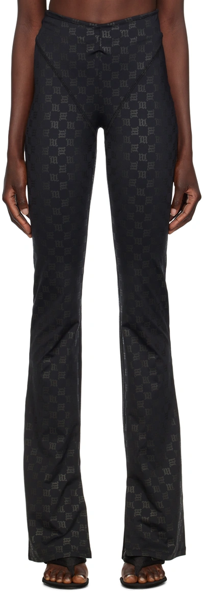 Misbhv All Over Monogram Slit Hem Flared Trousers In Black