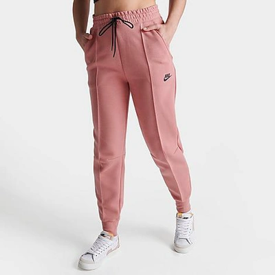 Shop Nike Women's Sportswear Tech Fleece Jogger Pants In Red Stardust/black