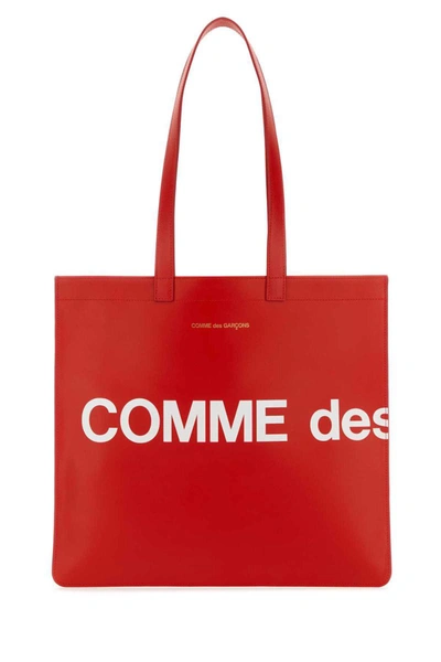 Shop Comme Des Garçons Handbags. In Red
