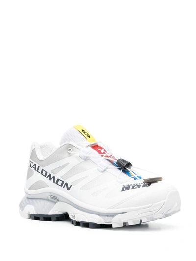 Shop Salomon Sneakers Low Top In White