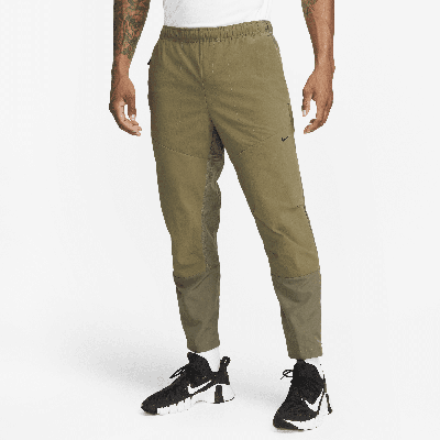 Shop Nike Men's A.p.s. Dri-fit Adv Woven Versatile Pants In Green
