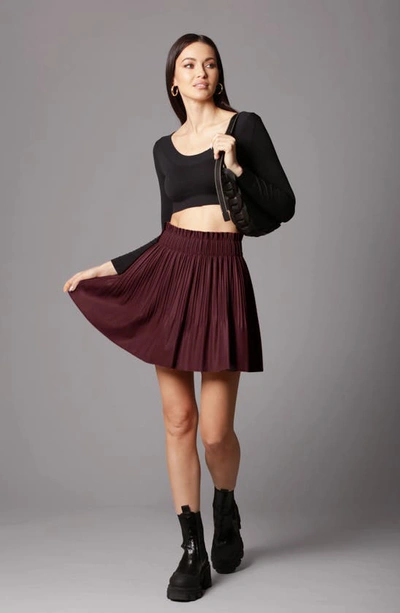Shop Avec Les Filles Faux-ever Leather™ Pleated A-line Miniskirt In Zinfandel