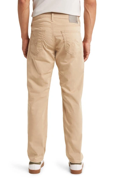 Shop Ag Tellis Airluxe™ Commuter Performance Sateen Pants In Drifting Sands